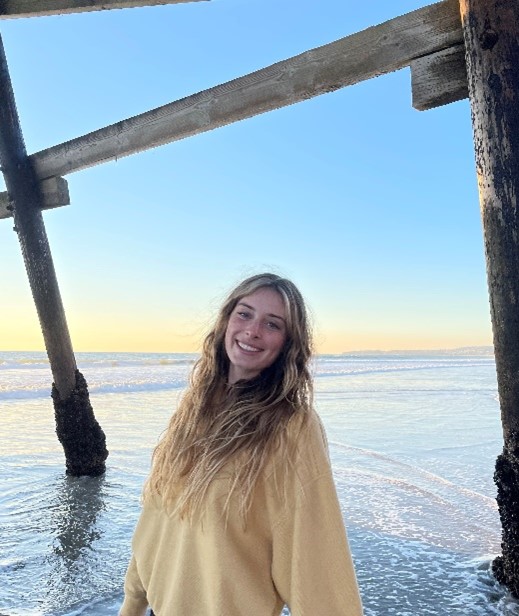 megan switzer in yellow shirt