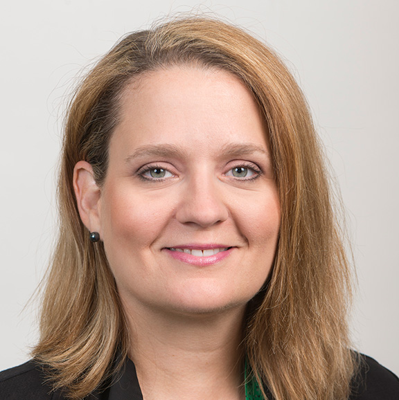 susan mills in black suit jacket