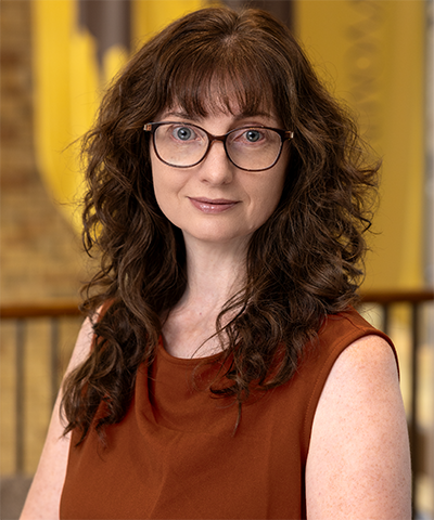 Headshot of Emma-Jane Alexander.