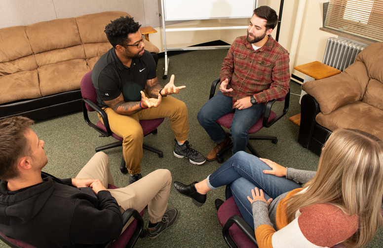 people chatting in a circle