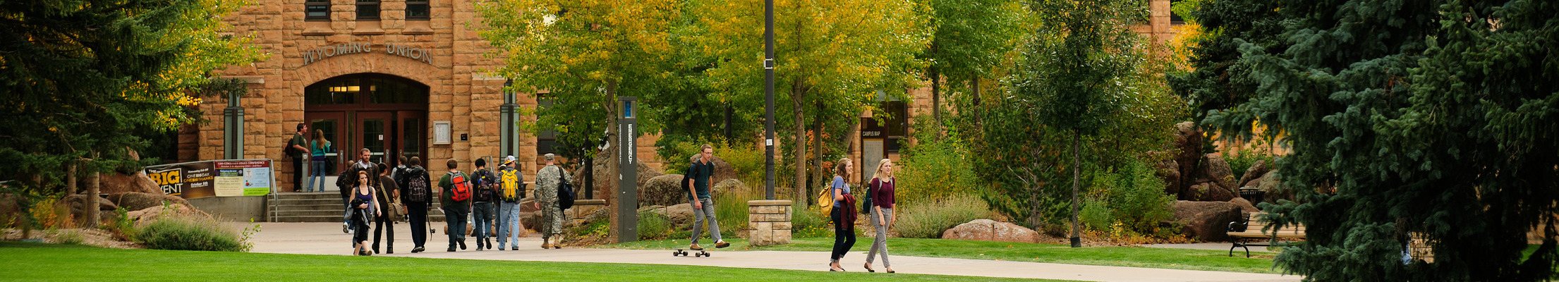 people walking across campus