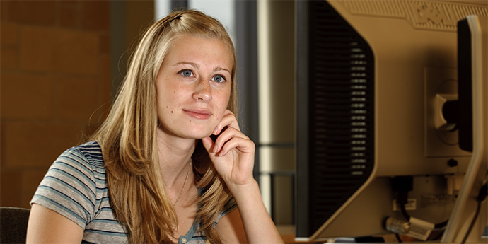 Student using assistive technology on her computer