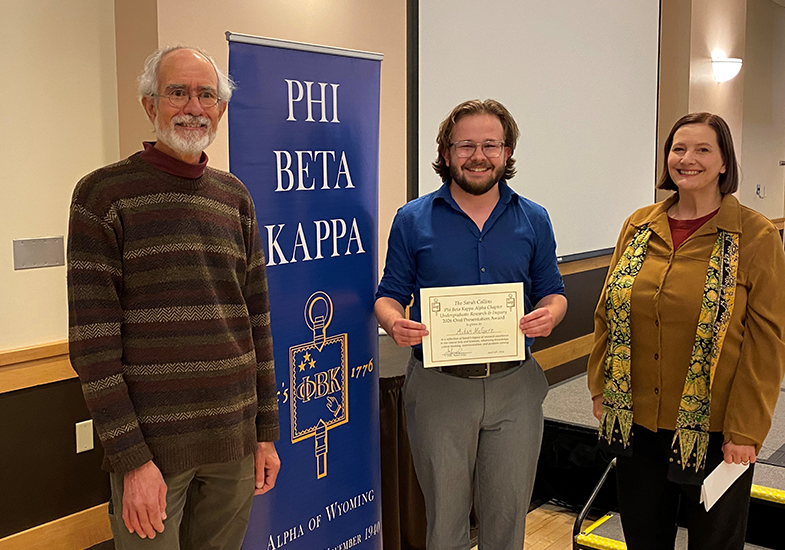 Aidan McGuire, oral award winner, flanked by Jim Herrold and Mollie Hand