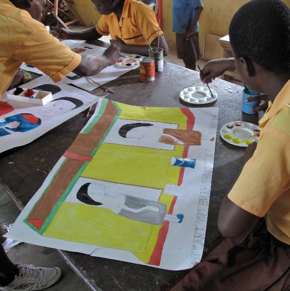 a young person in Ghana painting