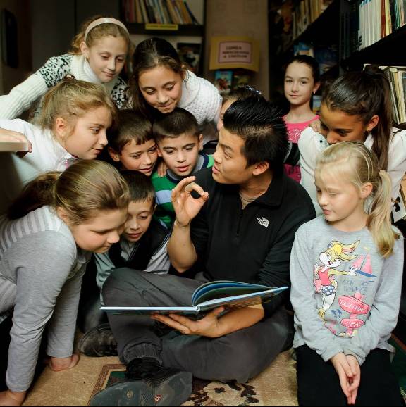 students in a library in Moldova