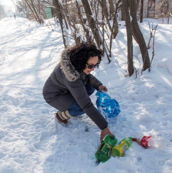 pcv picking up plastic in the Kyrgyz Republic