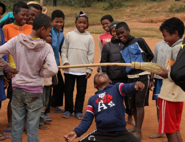 Boys in Madagascar playing the limbo