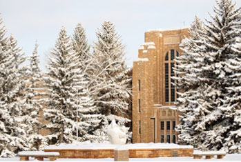 Snowy campus shot of the front of the CEAS building