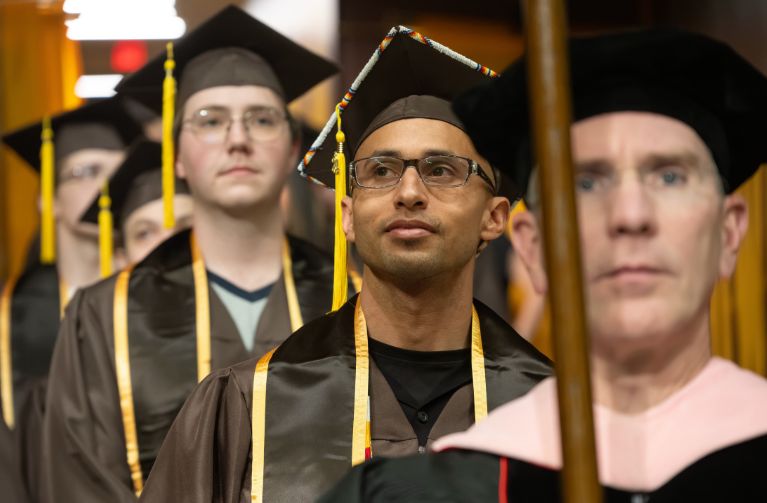 Picture of students at commencement ceremony.