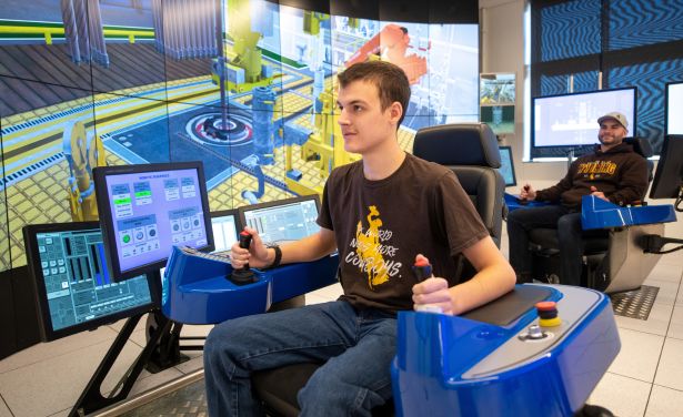 Picture of student using the DS 6000 located in the Drilling and Completions Simulation Facility.
