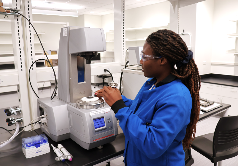 PhD student Cindy Agyemang working with the Modular Compact Rheometer