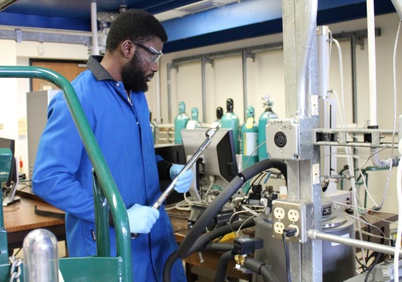 Graduate student working in the lab