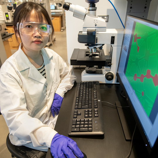 Picture of student researcher in the Hydrocarbon Lab.