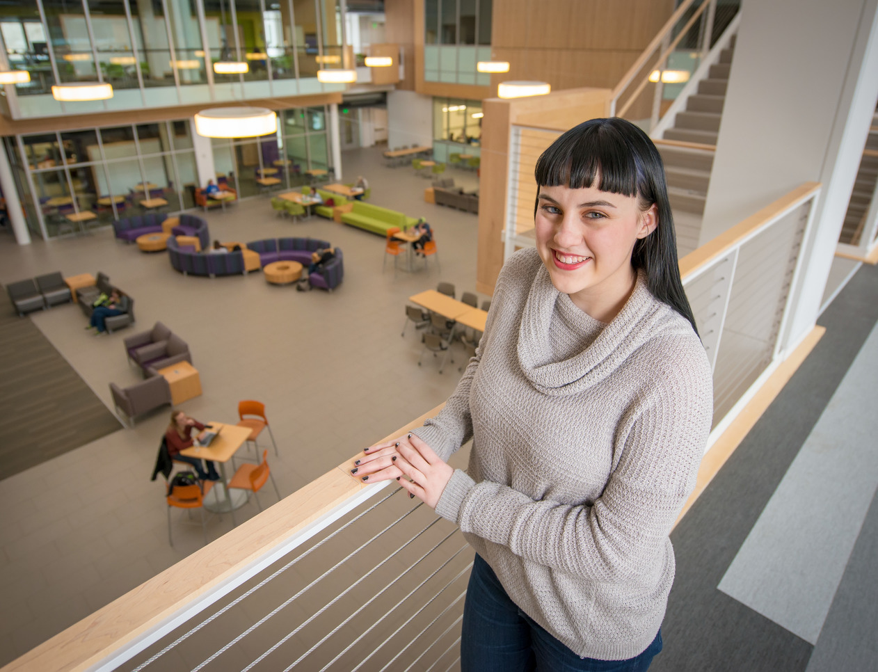 non-traditional student stands on campus