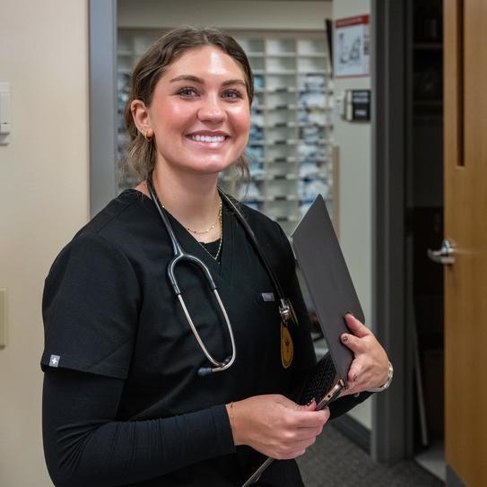 nursing student smiles at the camera
