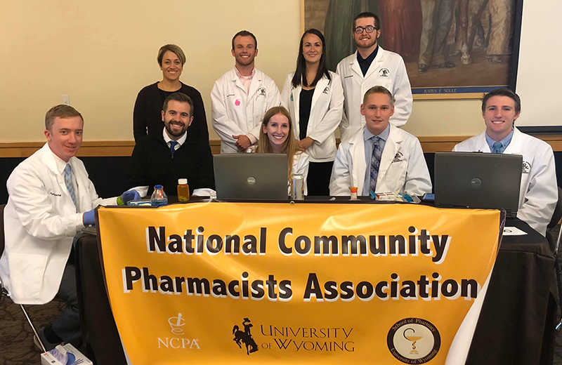Pharmacy students at a professional event.