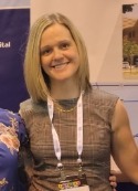 Smiling Woman in brown shirt