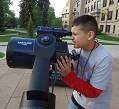 Child with telescope