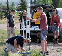 Summer camp students launching rocket