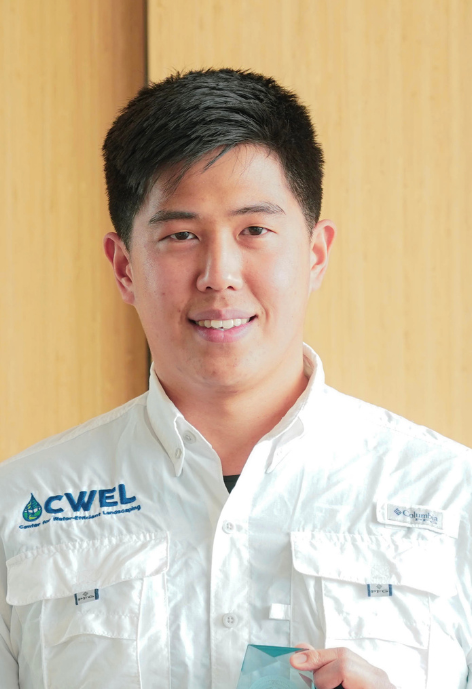 Smiling man in a lab