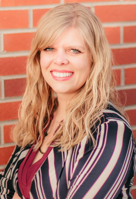Smiling woman wearing striped blouse