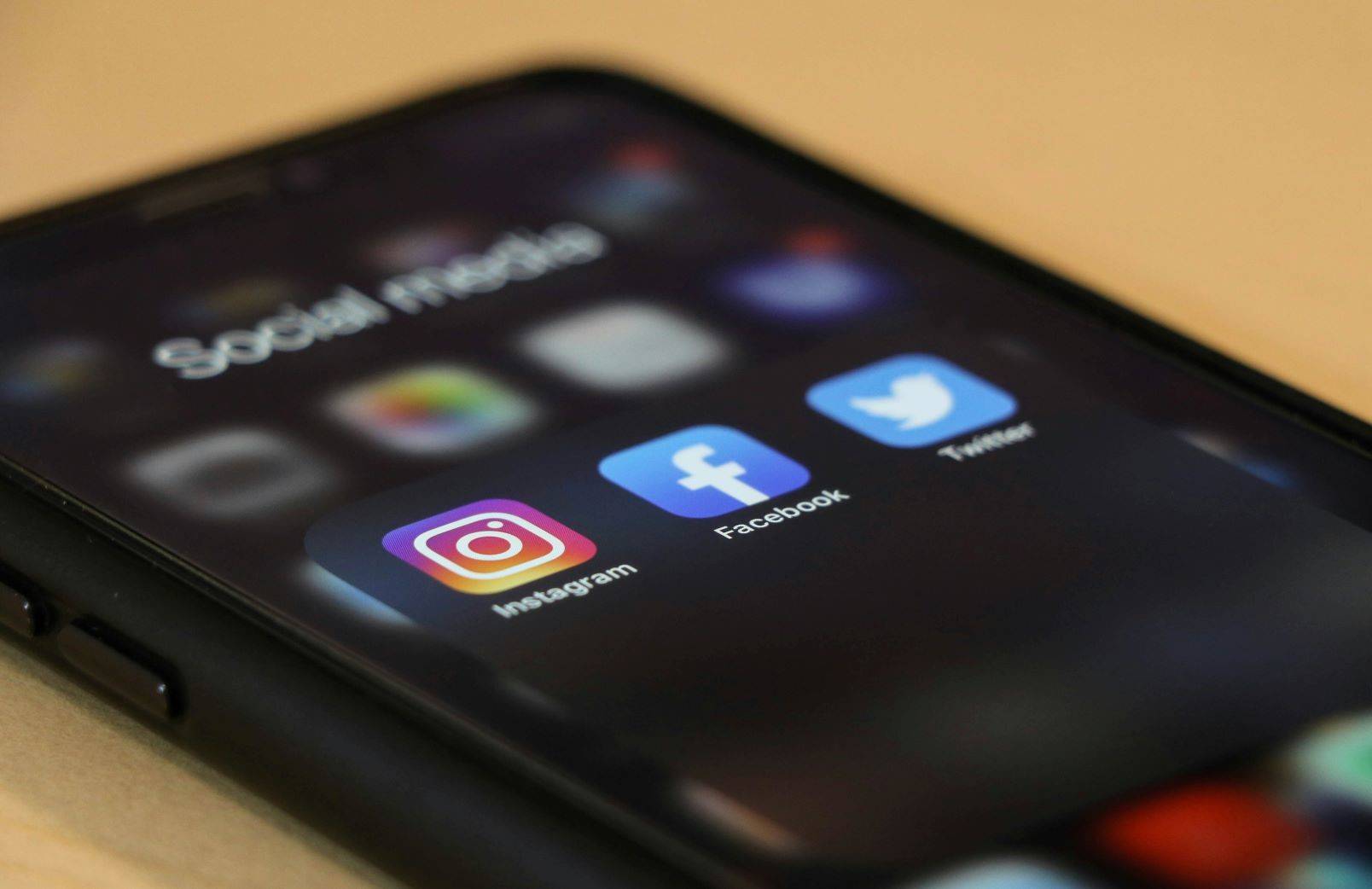 A phone screen with different social media app icons.