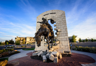 Breaking through statue