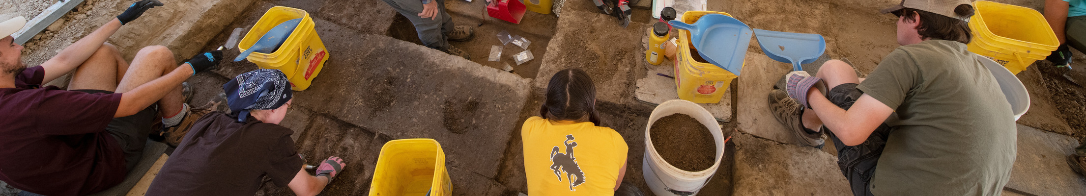 UW students excavating at an archeological site