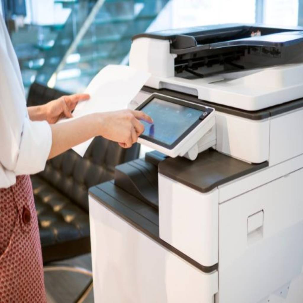 image of individual using a copier