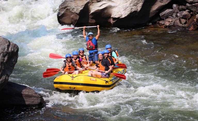 Faculty and grads white water rafting