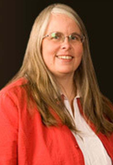 A woman in a red coat