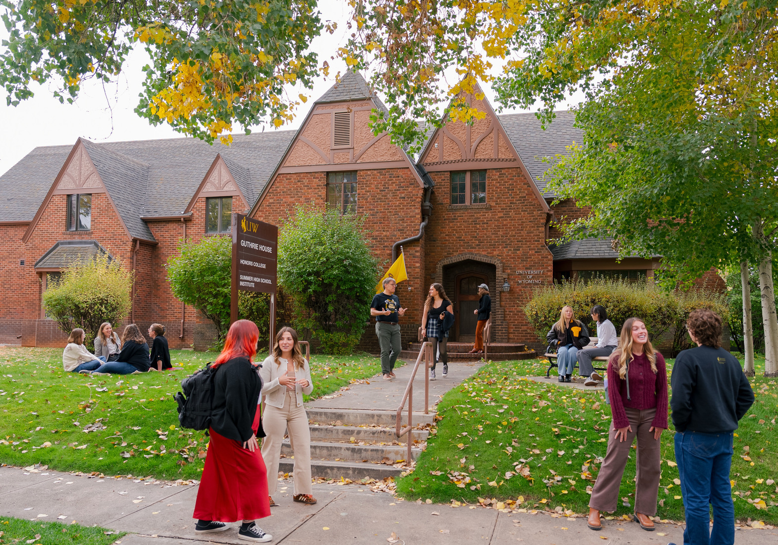 Students meet and greet in front of the Guthrie House.