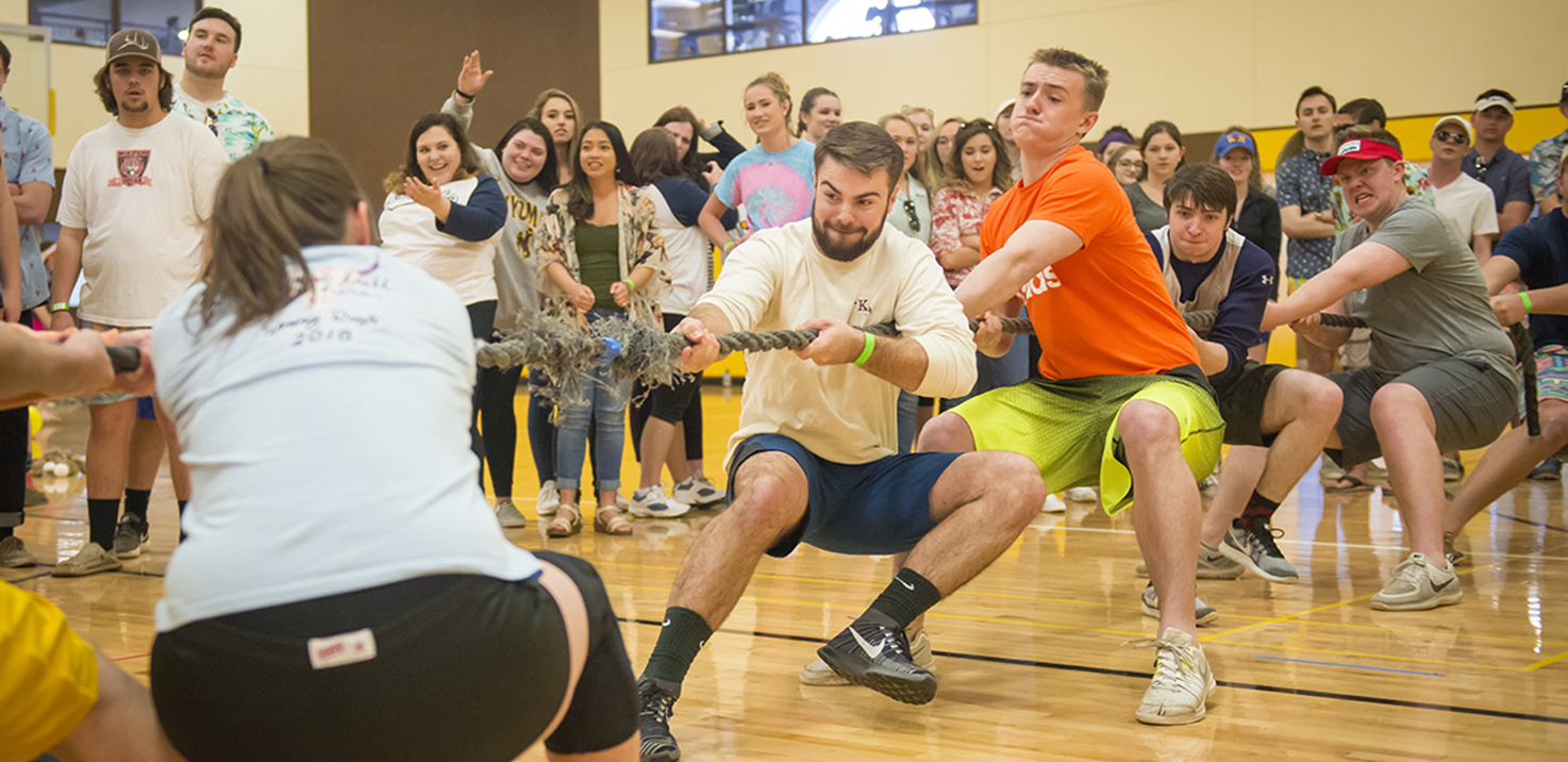 Students participate in a tug of war competition