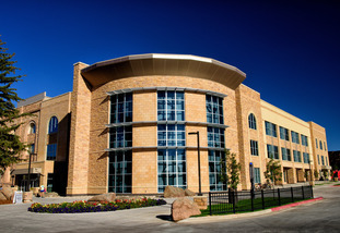 Half Acre Gymnasium and Wellness Center view from the outside on a sunny day