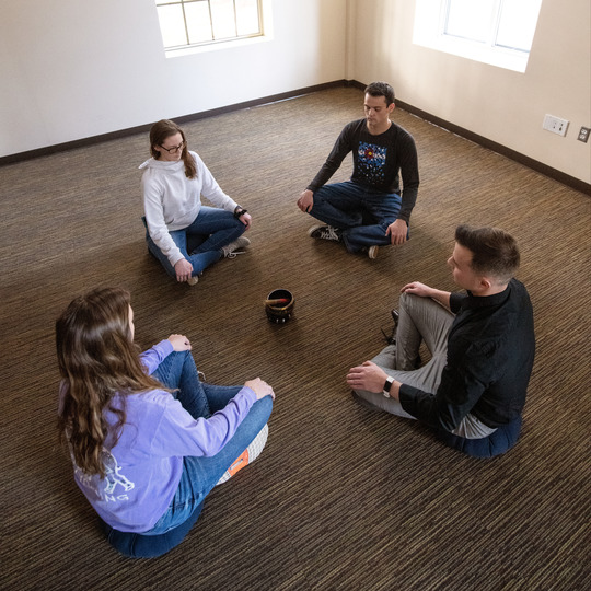 Students participate in guided meditation