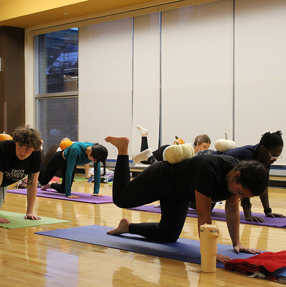 Student participate in a group fitness class
