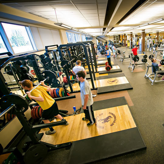 Students lift in the Half Acre weightroom