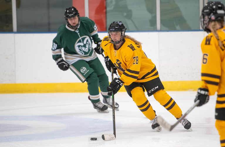 Students participate on the Club Women's Hockey Team