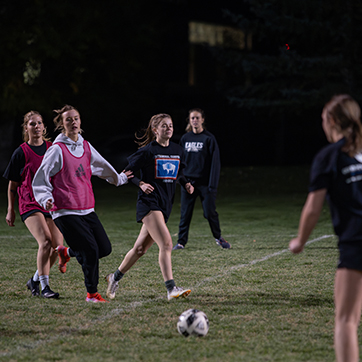 UW students play a game of soccer