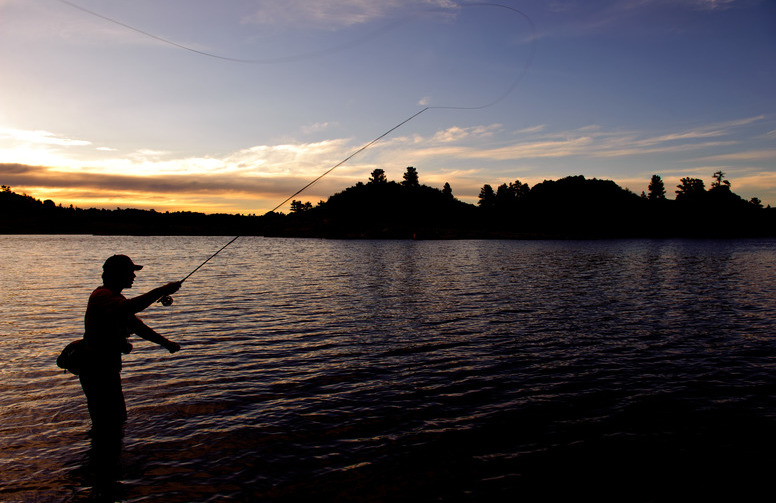 A student fly fishing near Laramie