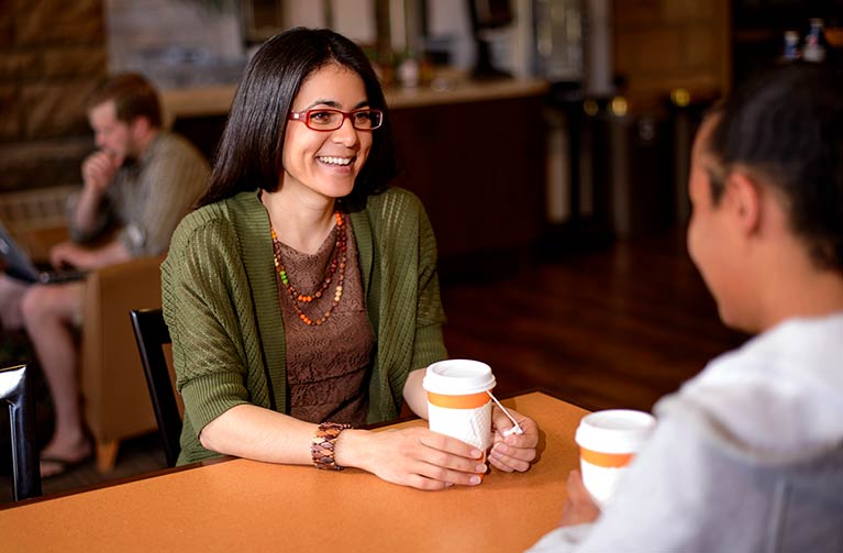 smiling people in a cafe