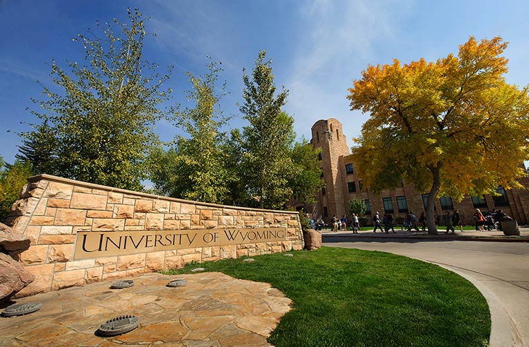 a stone sign saying University of Wyoming outside of the UW Union Building