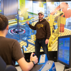Professor presenting the Drilling and Completions simulation lab