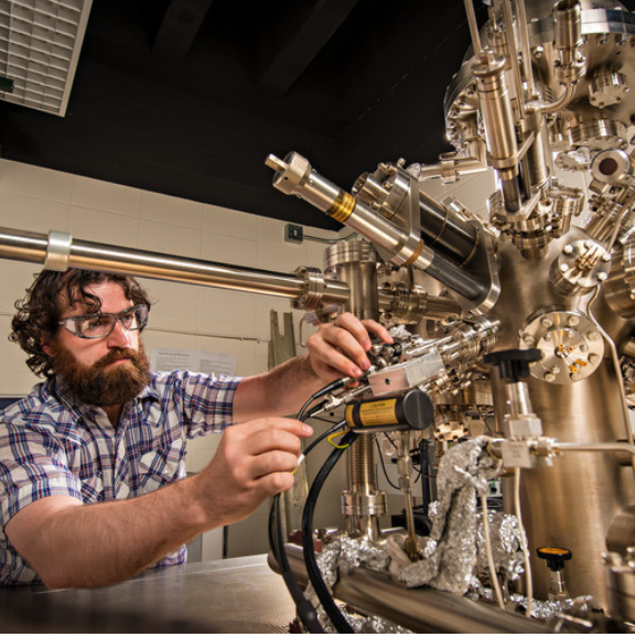 Person working on complex machinery