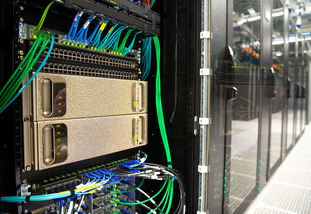 The image shows the inner workings of an advanced computing device at the University of Wyoming.