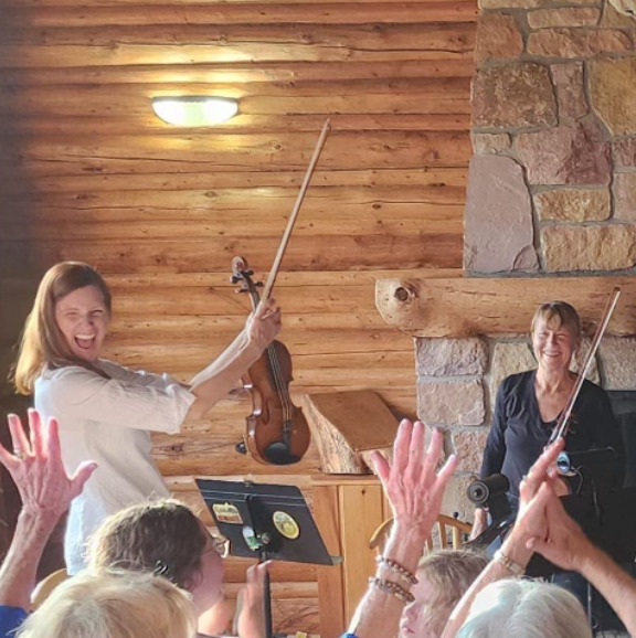 Musicians in front of a crowd