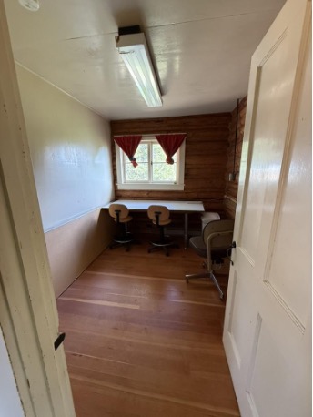 Lab three showing small room with small table and closet