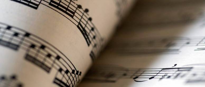 Music notes on a turning page