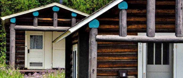 Two small cabins, one in front of the other