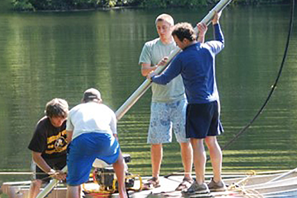 Bryan Shuman and students taking core samples